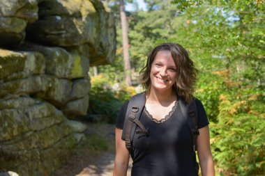 caucasian woman hiking in the french forest of Fontainebleau