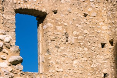 Stone window and brickwork of Chateau de Miglos, or dArquizat, a ruined castle in Miglos, Ariege, Occitanie, France. It is a listed national historic monument of France.