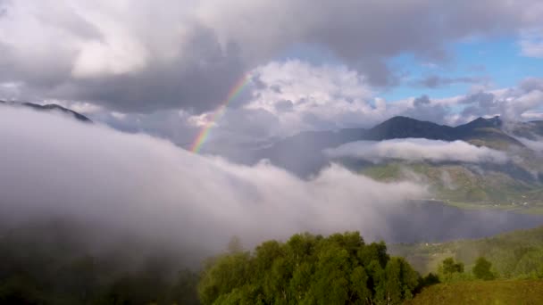 Puffy Clouds Forming Bright Colourful Double Rainbow Lights Sky Sea — Video Stock