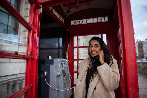 Girl Makes Phone Call Red Telephone Box London Beautiful Smiling — Fotografia de Stock