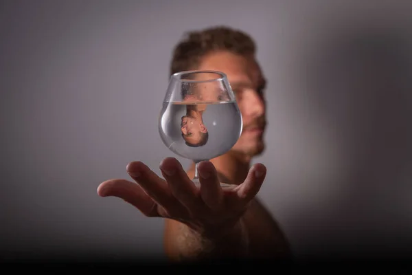 Boy Holds Glass Water His Reflection Distorted Perspective Abstraction Creative — Stock Photo, Image