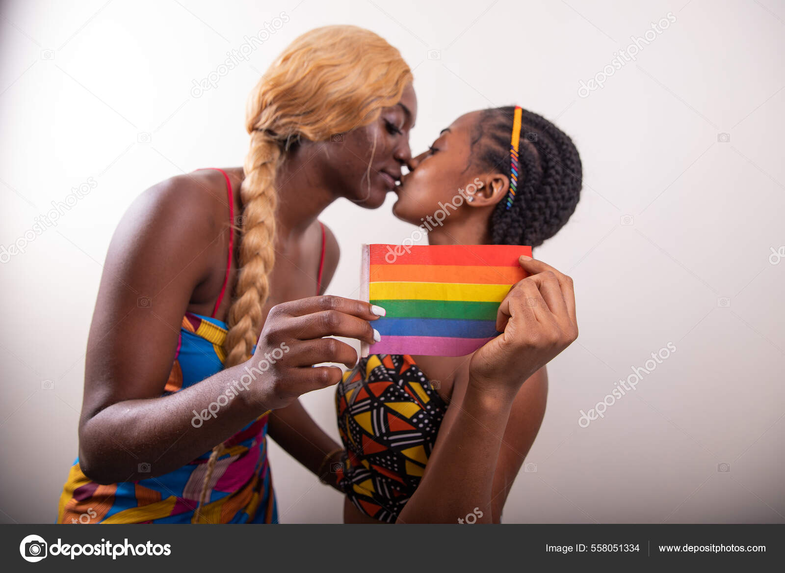 Two African Lesbian Girls Kiss Hold Rainbow Flag Same Sex Stock Photo by ©matteoguedia 558051334 photo photo