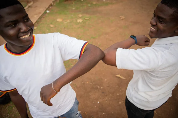 Two Friends Africa Greeting Each Other Elbows Reduce Contact Coronavirus — Stock Photo, Image