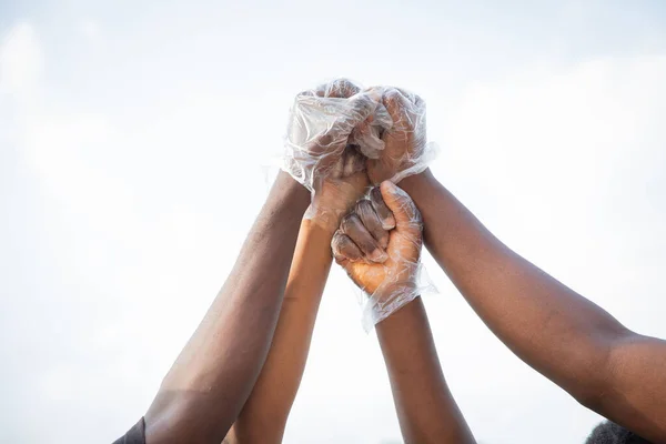 Four Fists African People Raised Sky Join Together Protest — Zdjęcie stockowe