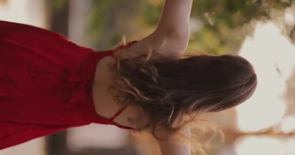Vertical Video Woman Red Dress Walking Alley Summer Park Raised — Video Stock