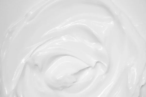 Crema hidratante mancha mancha textura ondulada. Cuidado de la piel belleza producto cosmético —  Fotos de Stock