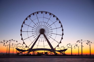 Baku. Azerbaijan. 12.28.2020 year. Ferris wheel at sunrise.