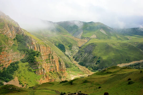Beautiful red mountains in the gorge. The road to the village of Gryz. Guba region. Azerbaijan.
