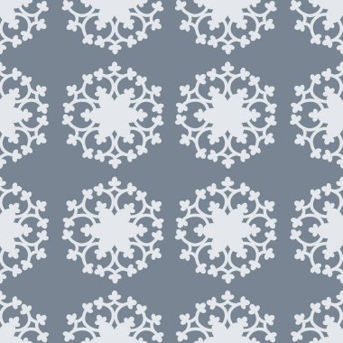 Pattern. Bright seamless abstract pattern with the image of abstract figures in white. Pattern with an ornament for printing on a gray background. Vector illustration.