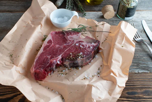 Raw Steak Butcher Paper Raw Uncooked Bone Porterhouse Steak Dry — Stock Photo, Image