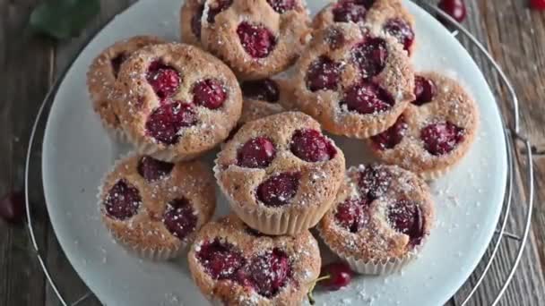 Heap Fresh Homemade Baked Muffins Sour Cherries Plate Isolated Wooden — Vídeos de Stock