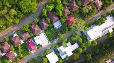 Aerial drone shot of suburb area surrounded by green eco-friendly environment for housing and real estate project top view