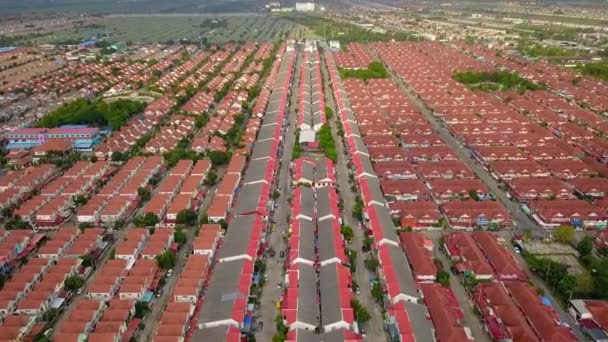 Aerial drone shot of suburb area surrounded by high density village in overpopulation city for housing and real estate property — Stockvideo