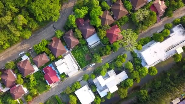 Aerial drone shot of suburb area surrounded by green eco-friendly environment for housing and real estate project top view — Vídeo de Stock