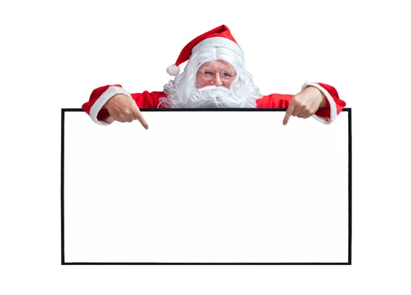 サンタクロースは 商業コンセプトのための白い背景に隔離された季節のプロモーション販売と発表ボード広告のための白い空白の看板を保持し 指しています — ストック写真