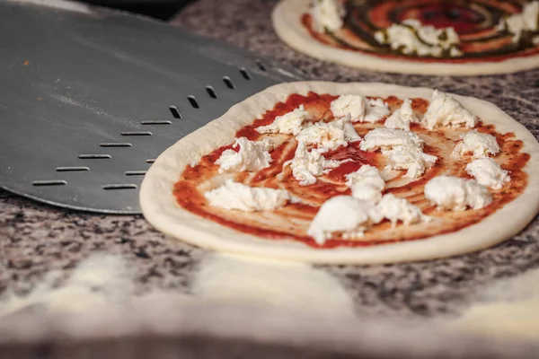 Process Cooking Pizza Mozzarella Tomato Sauce Marble Table — Stock Photo, Image