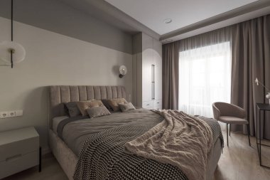 Modern yatak odasının içi pastel renkte. Moda minimalist iç konsept