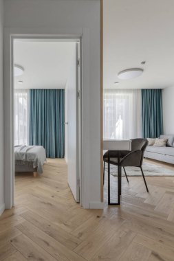 Modern minimalist interior design  with wooden furniture, oak floor in Scandinavian style.  Aesthetic simple interior design concept.