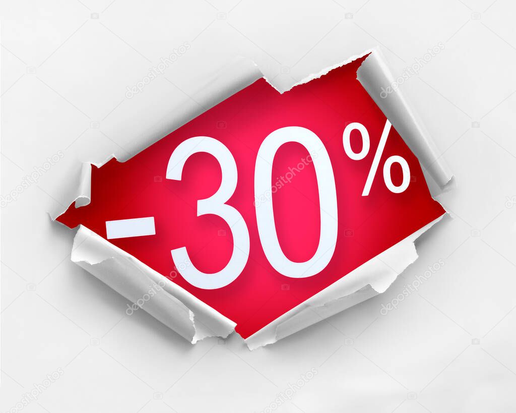 White color hole ripped paper against 30 percent discount message in red color