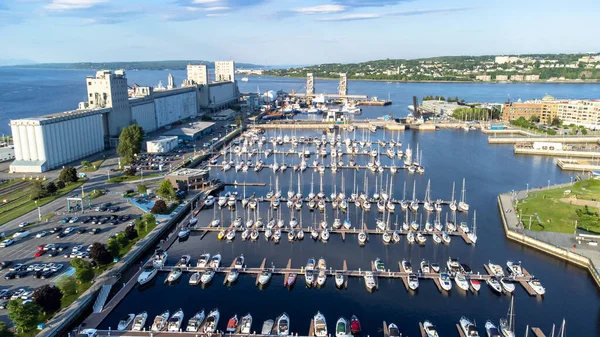 Aerial view of Quebec city\'s marina in the Old port. View on Orlean\'s Island and St. Lawrence river.