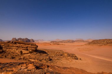 Wadi Rum Desert landscape in Jordan. Dunes and mountains. Travel and tourism concept.