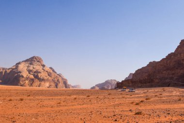 Wadi Rum Desert landscape in Jordan. Dunes and mountains. Travel and tourism concept.