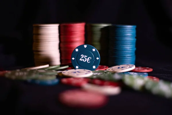 Poker set.  Set for the game.  Game set.  Board game.  Playing on a black background. 