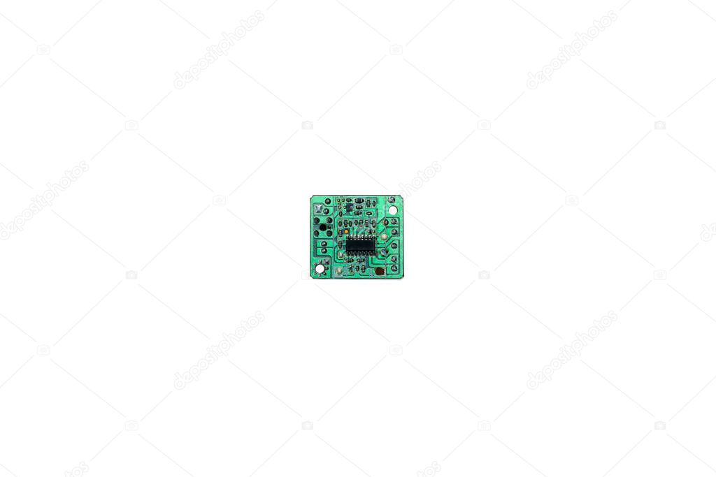 Close up of a small electronic printed circuit board.