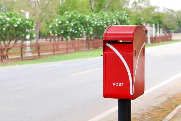 Red Post Box Roadside — Zdjęcie stockowe