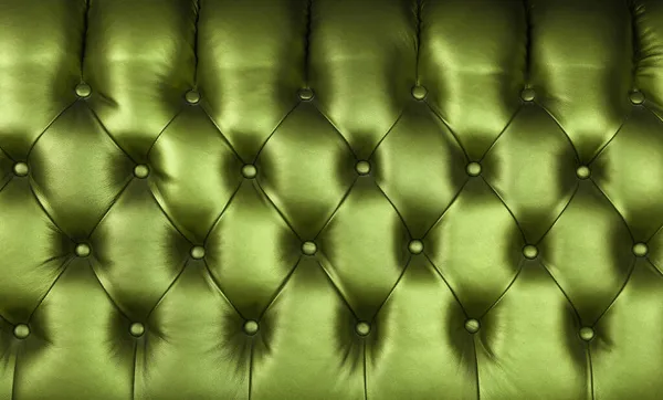 ダークグリーンのキャピトル本革の背景テクスチャ 深いダイヤモンドパターンとボタンを持つレトロなチェスターフィールドスタイルの柔らかい家具の張り クローズアップ — ストック写真