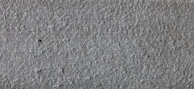 Düz olmayan açık gri beton yüzeyin arkaplan dokusu