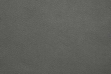 Siyah doğal deri taneciklerinin arka plan dokusunu kapat.