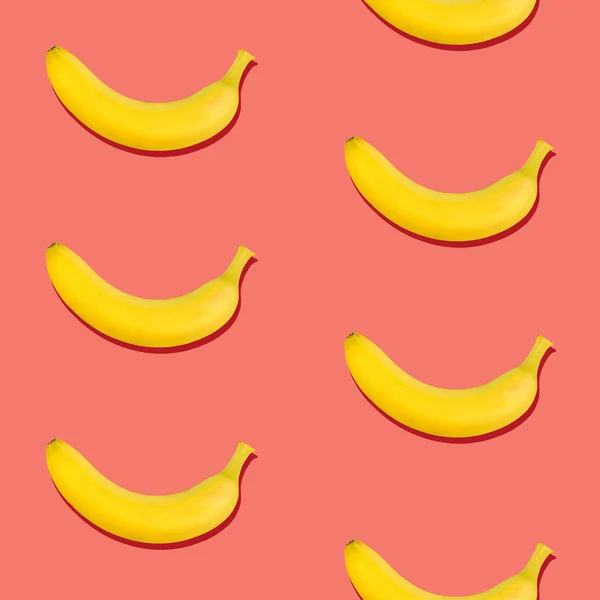 Seamless Pattern Fresh Ripe Yellow Bananas Coral Pink Background — 스톡 사진