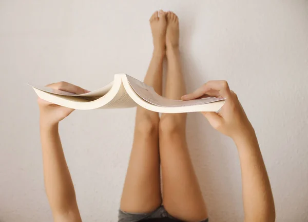 View Girl Reading Book Her Room Lying Her Back Bed — Stock Photo, Image