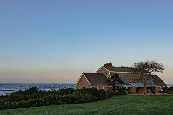 Clear sky and green grass, area view of Montauk Point State Park in a sunset Long Island NY. High quality photo