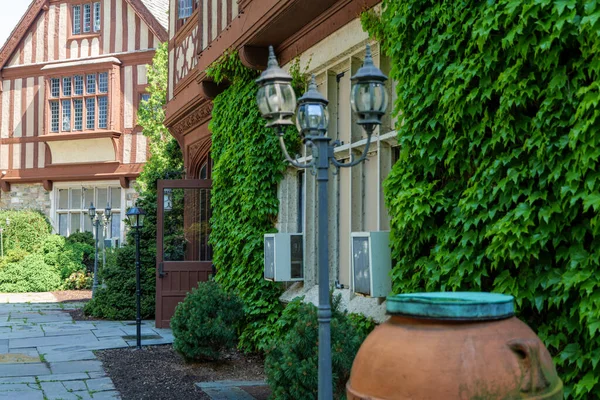Old building, New Jersey Garden State Manor House, Englands Design, creeping ivy on the wall High-quality photo