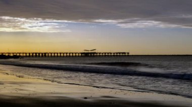 Sunrise on the beach in Coney Island New York City, areal view . High-quality 4k footage