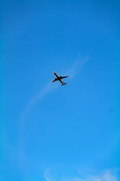 Low angle view of airplane against the sky with space for text. High-quality photo