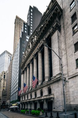 Front of the 1908 New York Stock Exchange on Broad Street with American flags on a front. High quality photo