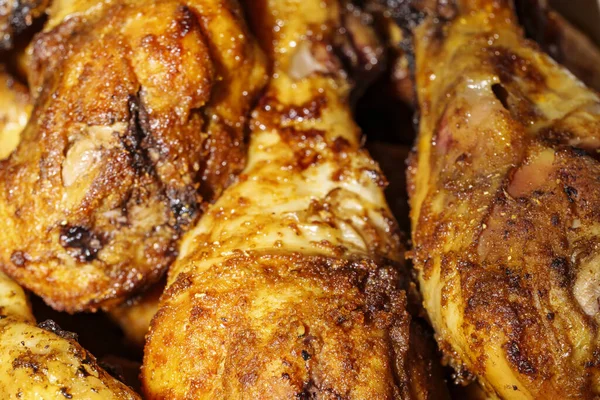 A close up of fried chicken legs, drumsticks, tasty and unhealthy food compilation. High quality photo