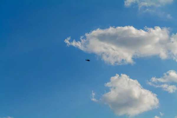 Static Image Dark Helicopter Flying Head Blue Cloudy Sky Background — Stockfoto