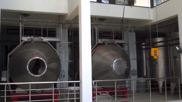 Tilt View Interior Winery Fermentation Equipment Building Large Metal Tanks — Stock Video