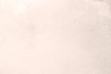 Beyaz ısınan taş dokusunun yüzeyinde kaba, gri-beyaz bir ton var. Duvar kağıdı veya arkaplan resmi için bunu kullanın. Metin için boş bir boşluk var.