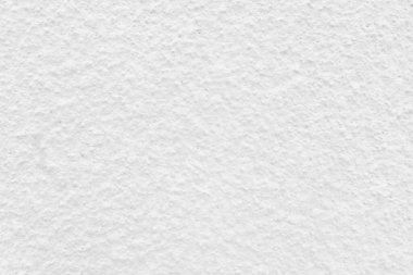 Beyaz beton duvarın pürüzsüz dokusu kaba bir yüzey, metin için boşluk, arkaplan için alan.