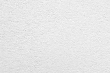 Beyaz beton duvarın pürüzsüz dokusu kaba bir yüzey, metin için boşluk, arkaplan için alan.