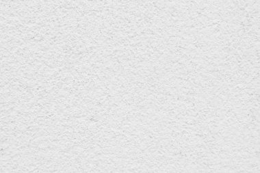 Beyaz beton duvarın pürüzsüz dokusu kaba bir yüzey, metin için boşluk, arkaplan için alan.