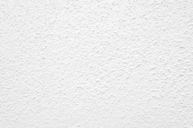 Beyaz beton duvarın pürüzsüz dokusu kaba bir yüzey, metin için boşluk, arkaplan için alan.