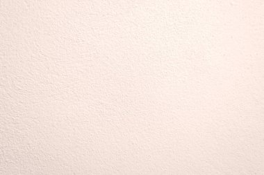 Seamless texture of white warming cement wall a rough surface, with space for text, for a background.	