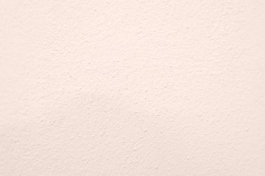 Seamless texture of white warming cement wall a rough surface, with space for text, for a background.	