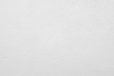 Beyaz beton duvarın pürüzsüz dokusu kaba bir yüzey, metin için boşluk, arkaplan için alan.